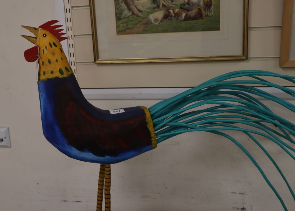 A painted wood model of a cockerel by WD Roach 1992 length 86cm approx.